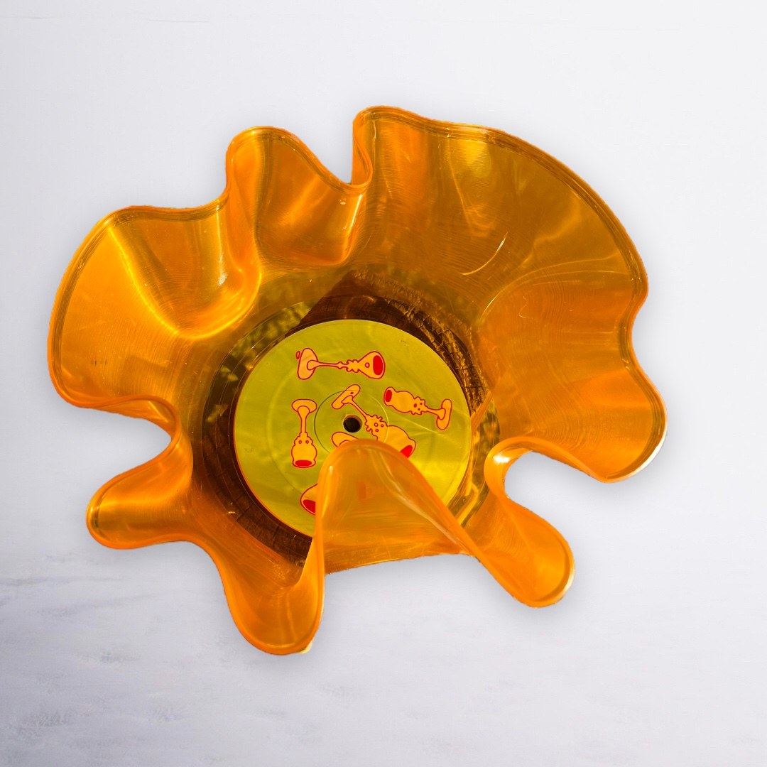 Amber bowl with a sculptural ruffled edge, viewed from above