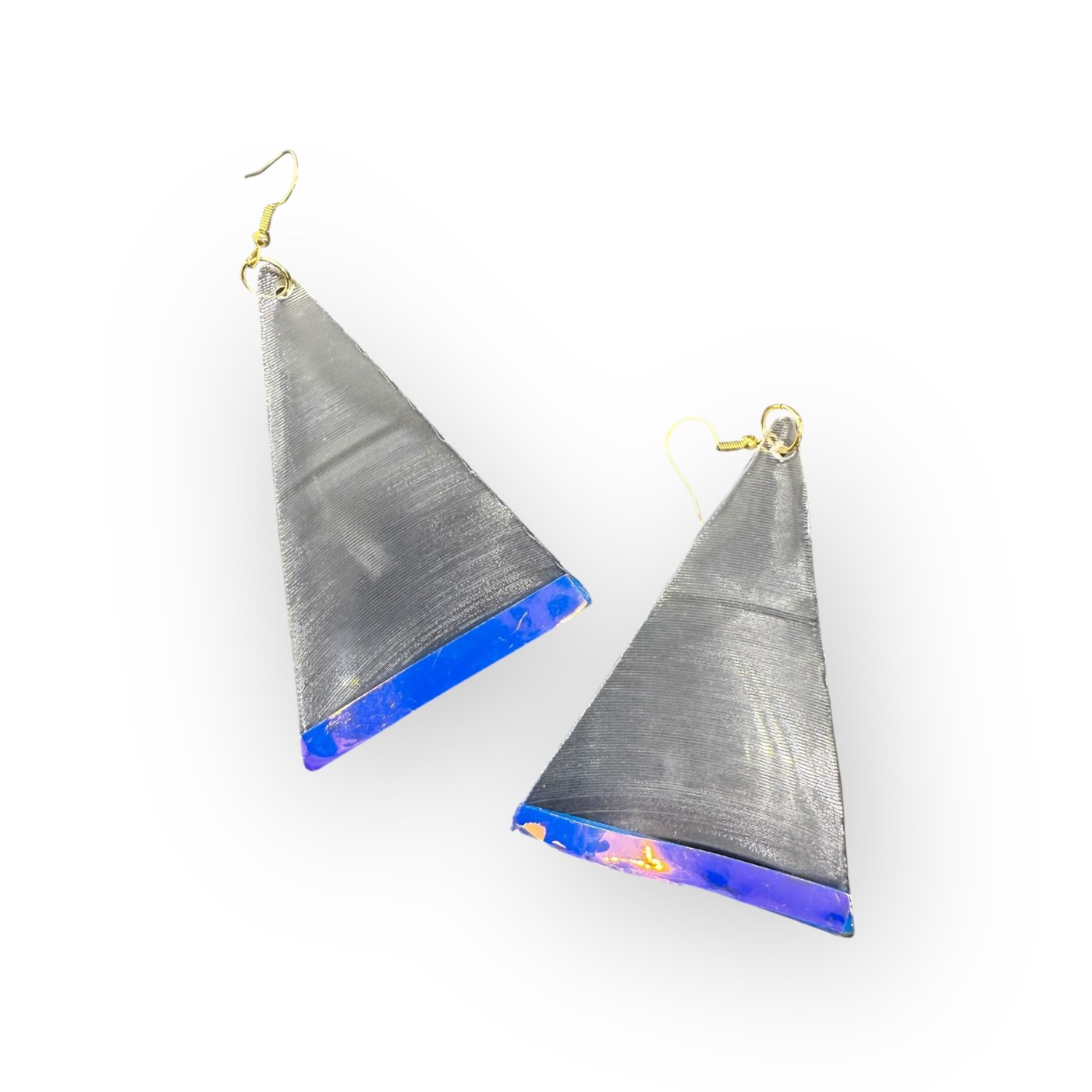 Dark triangular vinyl earrings with bright blue edges