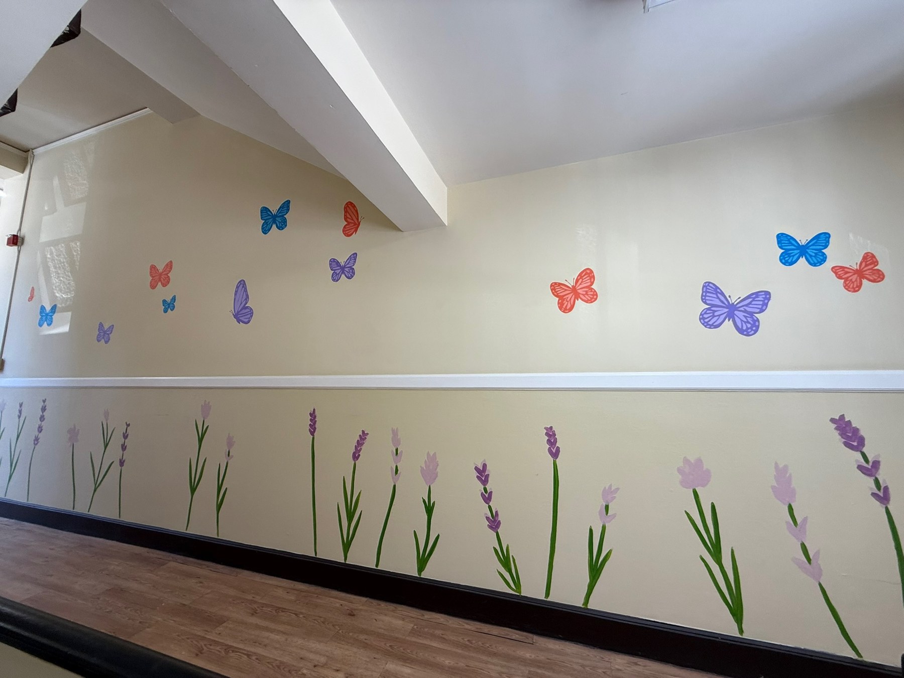 Interior mural with butterflies and flowers