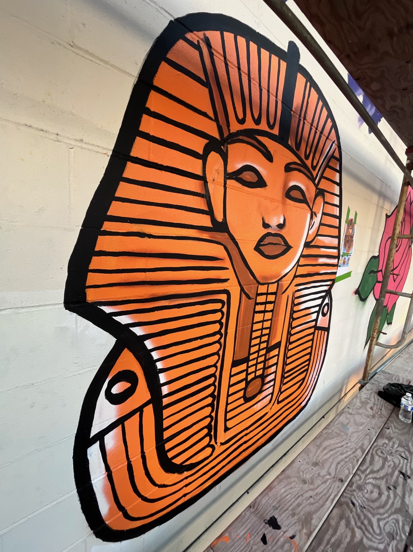 Orange and black pharaoh mural