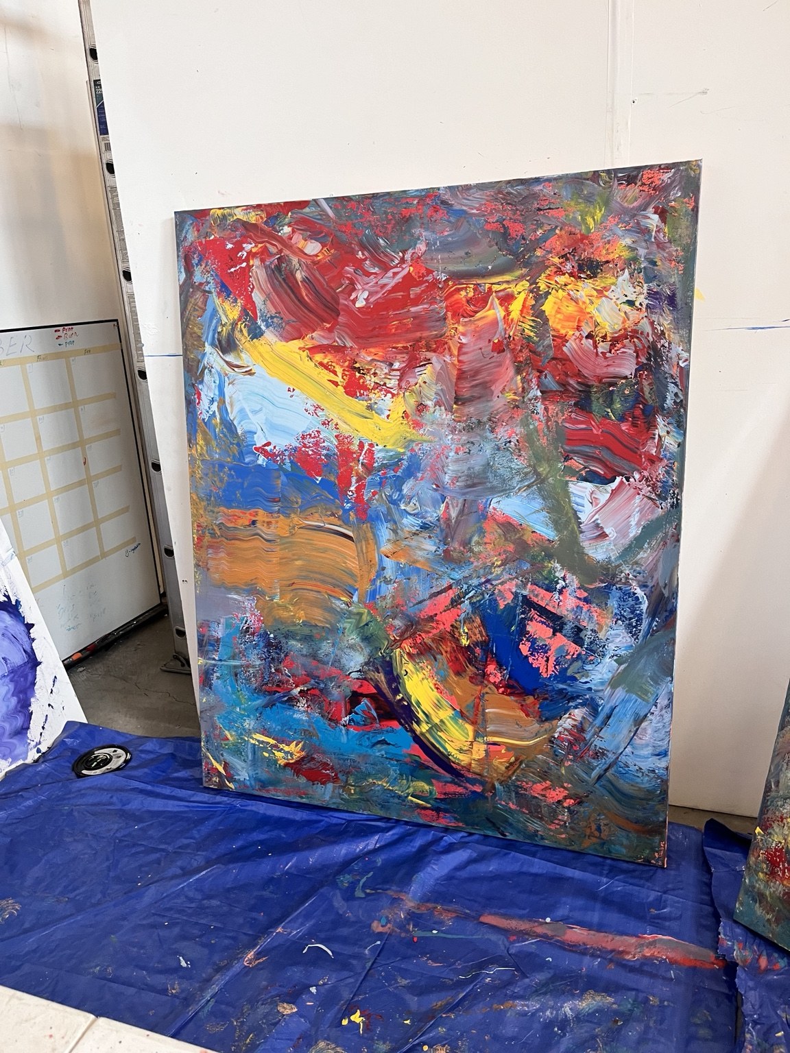 Layered abstract painting with bright gestural marks