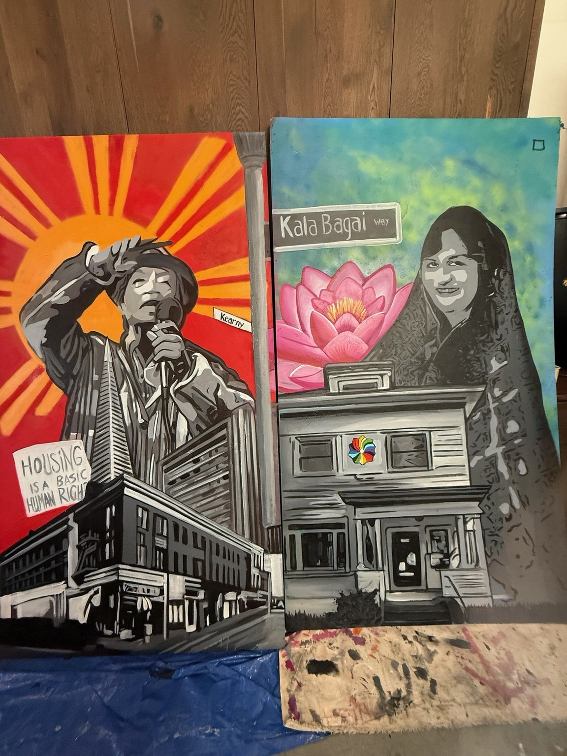 Portrait mural with cultural imagery and architecture