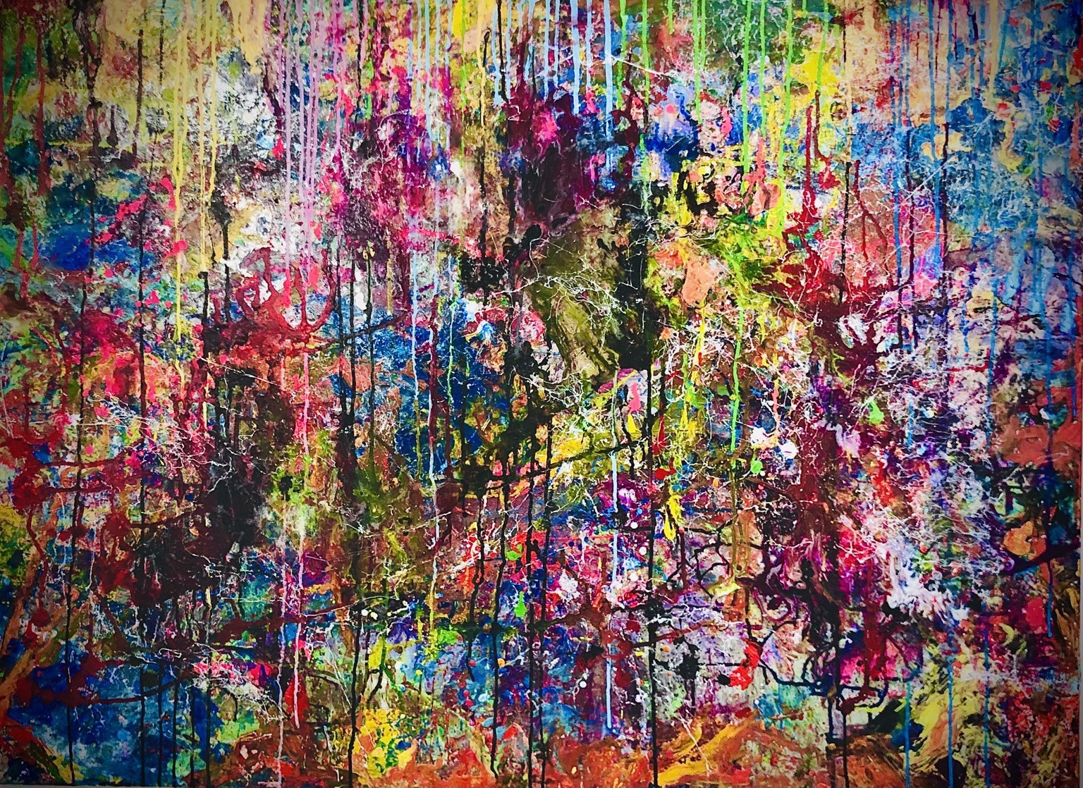 Colorful abstract painting with layered drips and expressive marks